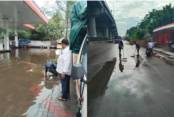 இந்தியன் ஆயில் அருகில் எருக்கஞ்சேரி நெடுஞ்சாலையில் தேங்கி நிற்கும் மழைநீர்